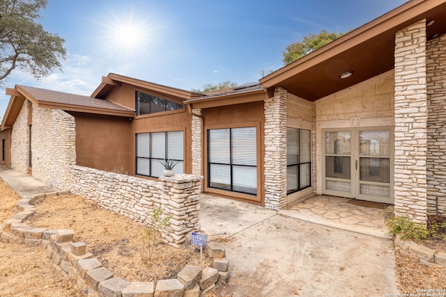 rear view of property with a patio