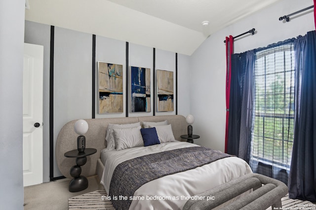 carpeted bedroom featuring vaulted ceiling