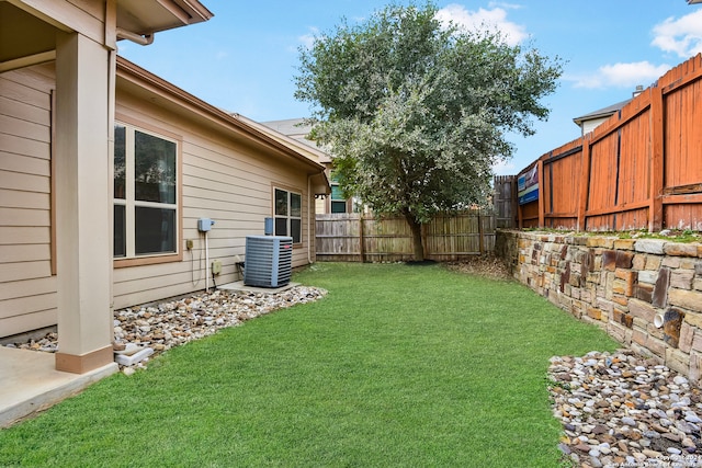 view of yard featuring central AC