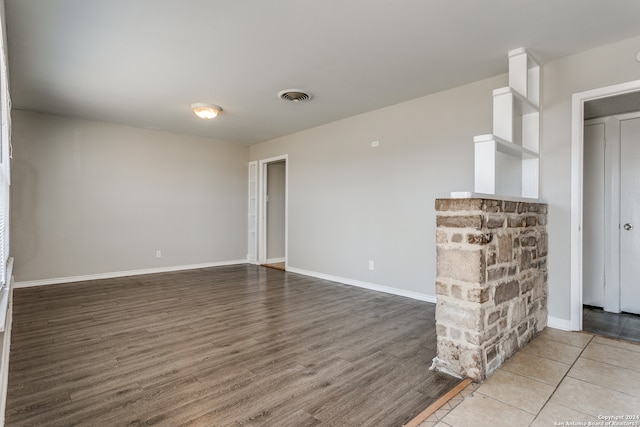 unfurnished room featuring light wood-type flooring