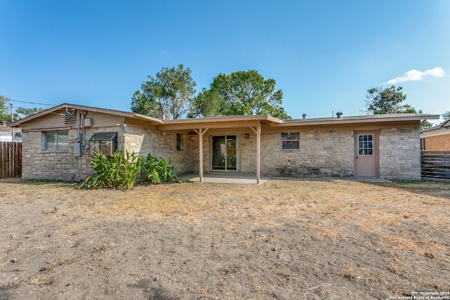 rear view of property with a patio