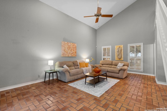 living room featuring high vaulted ceiling and ceiling fan