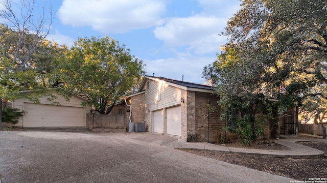 ranch-style home with a garage