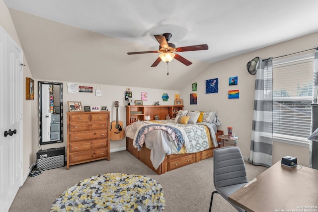 carpeted bedroom with ceiling fan and lofted ceiling