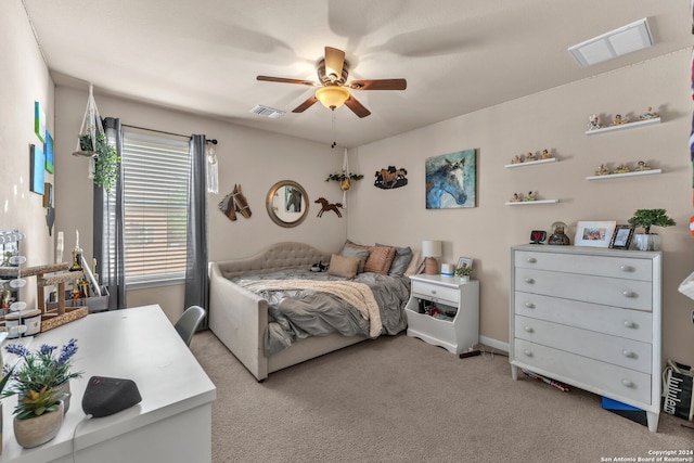 carpeted bedroom featuring ceiling fan