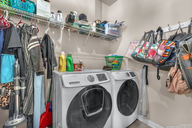 laundry room with washing machine and clothes dryer