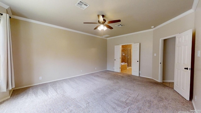 unfurnished bedroom featuring ceiling fan, light carpet, and crown molding