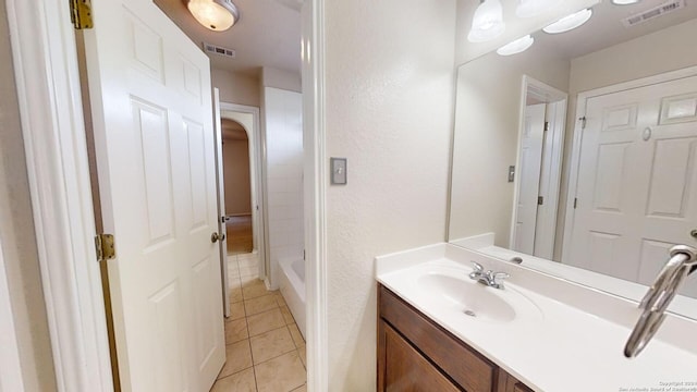 bathroom featuring vanity and tile patterned flooring