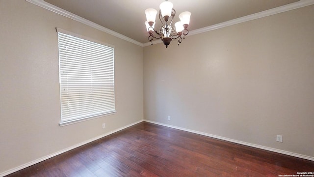 unfurnished room with an inviting chandelier, dark hardwood / wood-style flooring, and ornamental molding