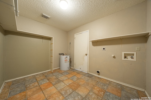 laundry room with hookup for a gas dryer, washer hookup, a textured ceiling, water heater, and hookup for an electric dryer