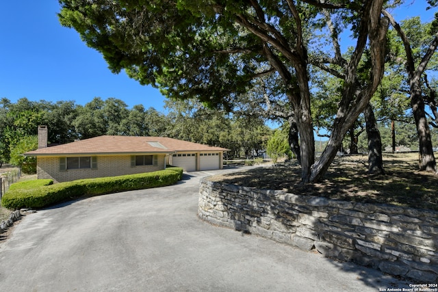 single story home featuring a garage