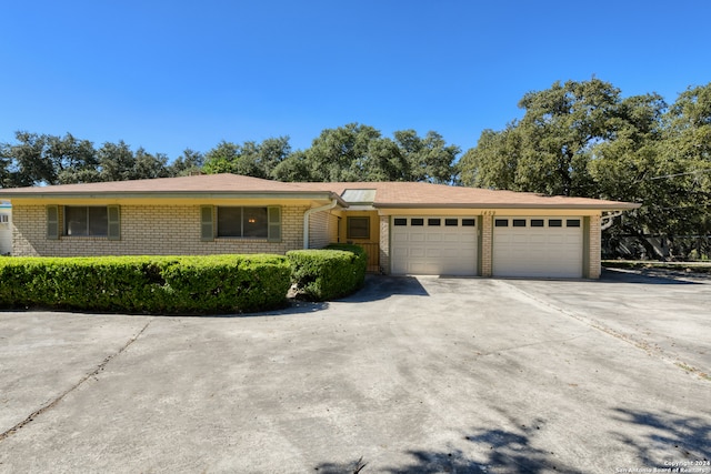 ranch-style home with a garage