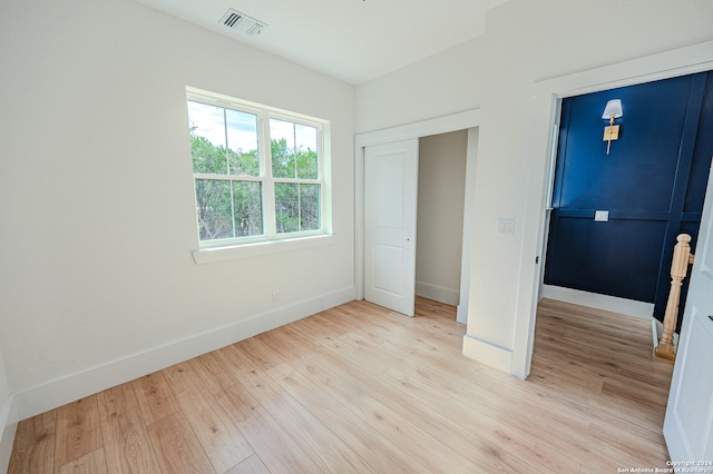 unfurnished bedroom with light hardwood / wood-style flooring