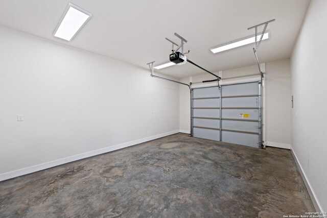 706 W Creek, Fredericksburg, TX 78624 - garage with a garage door opener