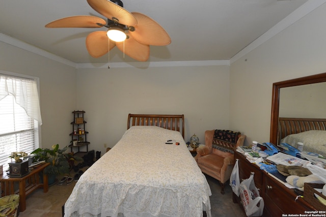 bedroom featuring crown molding, ceiling fan, and carpet floors