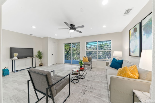 living room with ceiling fan