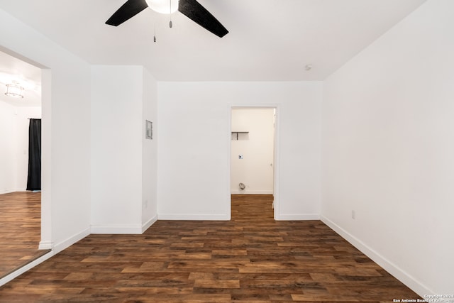 empty room featuring dark hardwood / wood-style floors and ceiling fan