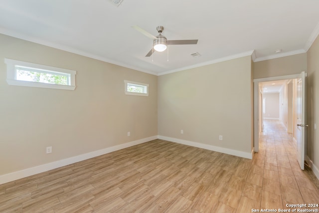 unfurnished room with light hardwood / wood-style floors, ceiling fan, and crown molding