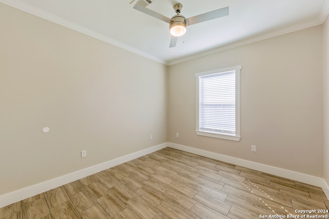 empty room with ceiling fan, ornamental molding, and light hardwood / wood-style flooring