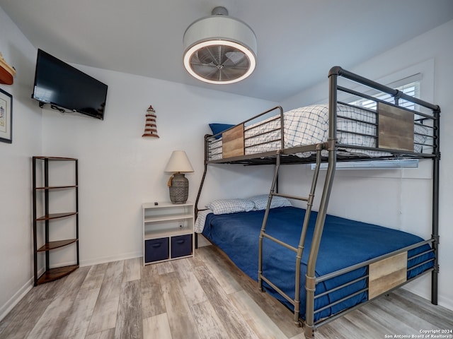 bedroom featuring wood-type flooring