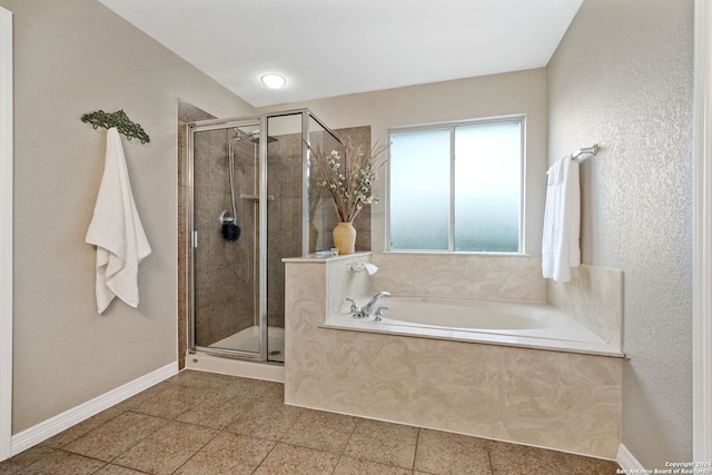 bathroom with separate shower and tub