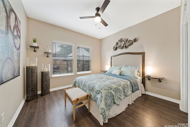 bedroom featuring dark wood-type flooring and ceiling fan