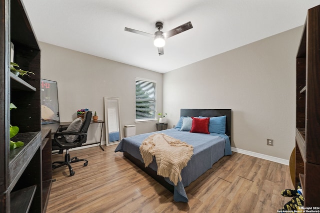 bedroom featuring ceiling fan and light hardwood / wood-style floors