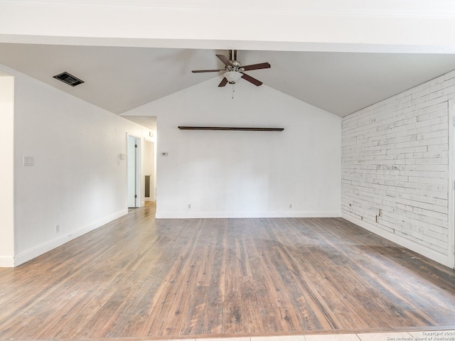 unfurnished room featuring ceiling fan, dark wood-type flooring, and lofted ceiling