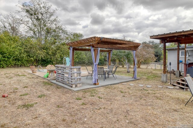 360 Benson Rd, Uvalde, TX 78801 - view of yard featuring a patio, fence, and a pergola