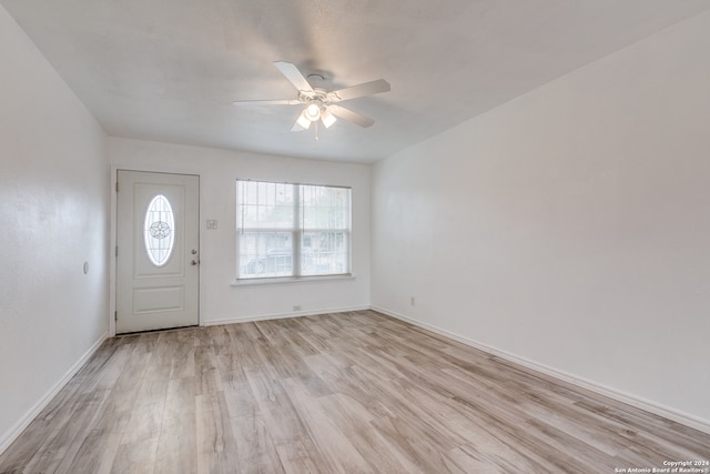 foyer entrance featuring light hardwood / wood-style flooring and ceiling fan