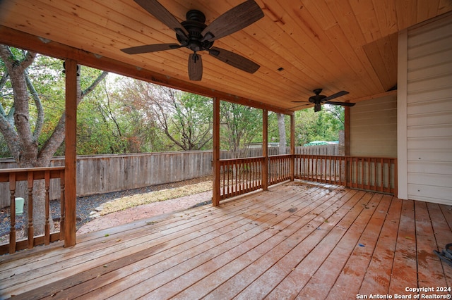 wooden terrace featuring ceiling fan