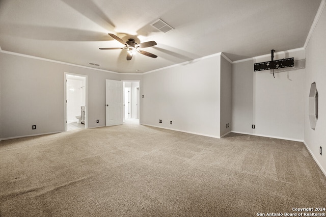 carpeted empty room with ceiling fan and ornamental molding