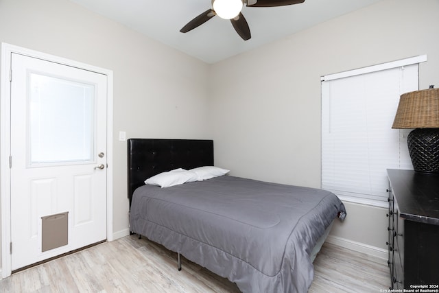 bedroom featuring ceiling fan and light wood-type flooring