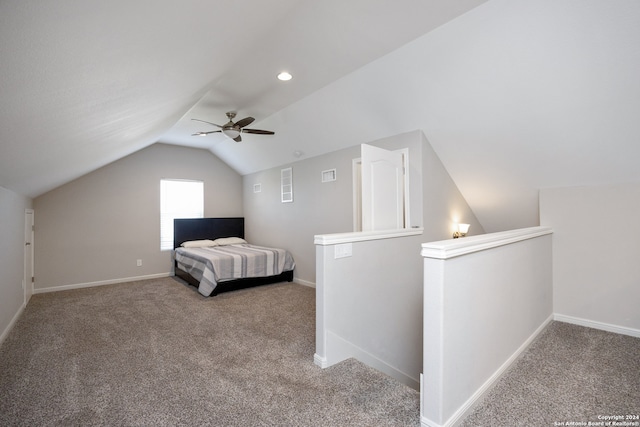 carpeted bedroom featuring lofted ceiling and ceiling fan