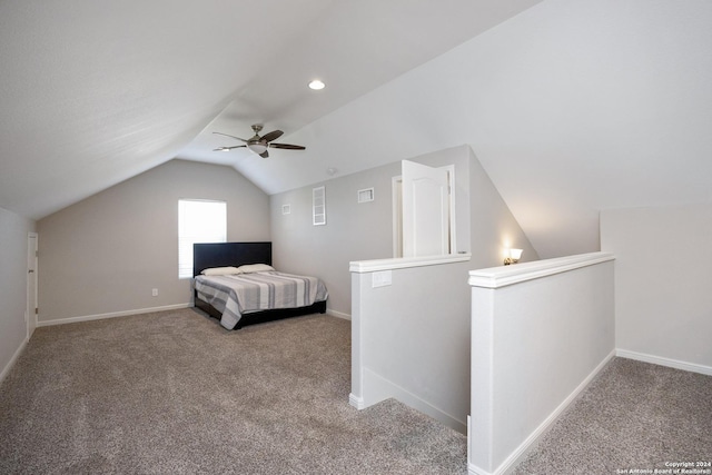1403 S Young, Rockport, TX 78382 - bedroom featuring carpet flooring, vaulted ceiling, a ceiling fan, and baseboards