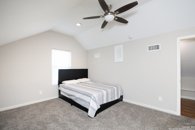 bedroom with lofted ceiling, carpet, and ceiling fan