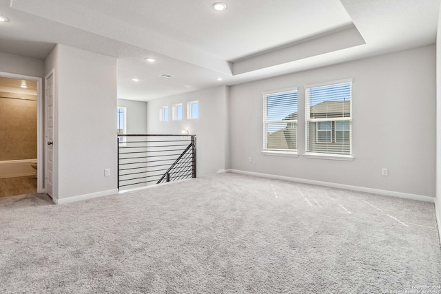 empty room with carpet flooring