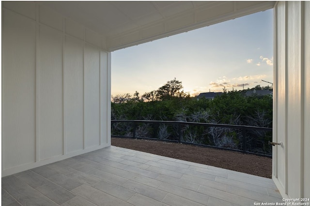 view of patio terrace at dusk