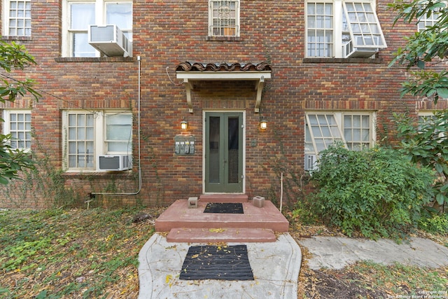 doorway to property with cooling unit