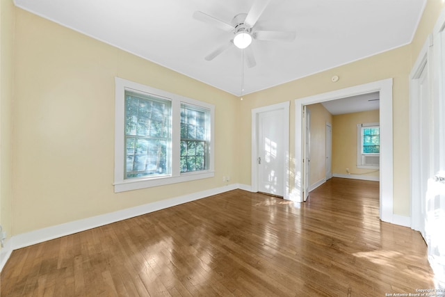 unfurnished room featuring wood-type flooring and ceiling fan