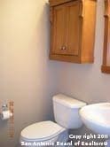 bathroom featuring toilet