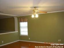 spare room with crown molding