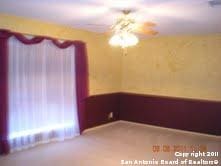 unfurnished room featuring ceiling fan