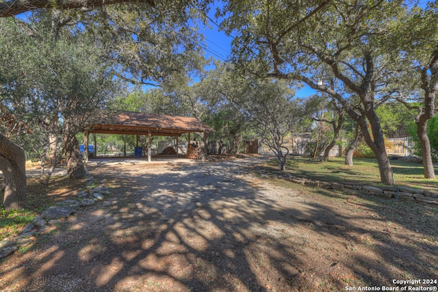 view of yard with a carport