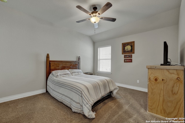 carpeted bedroom featuring ceiling fan and lofted ceiling