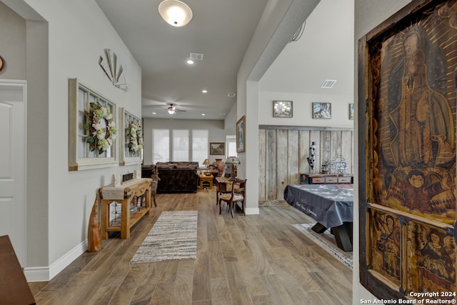 hallway featuring wood-type flooring