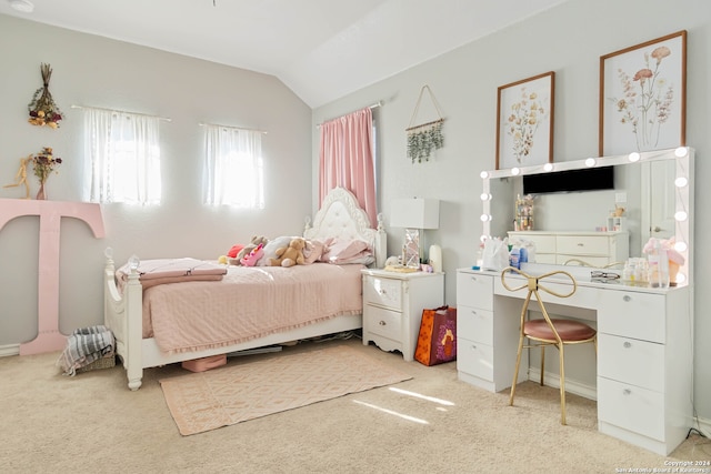 carpeted bedroom featuring vaulted ceiling