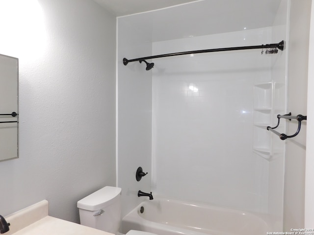 full bathroom featuring toilet, vanity, and bathing tub / shower combination