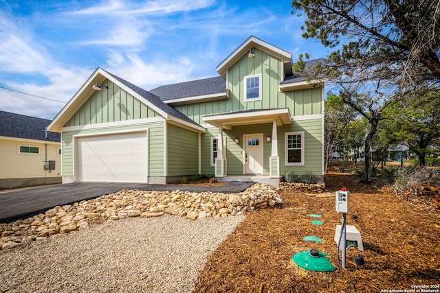 craftsman-style home with a garage and a porch