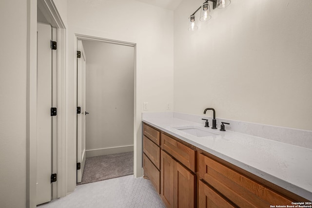 bathroom with vanity and tile patterned floors